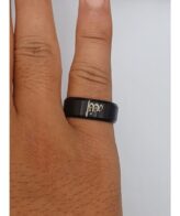 Ring Cincin Muslim Yangqi Cocktail Shahada H5013 Black | WP 0152 Ring Cincin Muslim Yangqi Cocktail Shahada H5013 Black 1. Features: - Shahada Engraving Design: Features an elegant Shahada inscription design, making it a meaningful and symbolic accessory for Muslim wearers as a daily reminder of faith. - Premium Titanium Construction: Crafted from high-quality titanium material, offering exceptional strength, lightweight comfort, and outstanding corrosion and tarnish resistance for long-lasting wear. - Black Finish: Finished in a sleek and modern black coating that gives the ring a bold and sophisticated appearance suitable for everyday and formal wear alike. - Comfortable Width and Thickness: Measures 8 MM in width and 2 MM in thickness, providing a substantial and comfortable feel on the finger without being overly bulky. - Wide Size Range: Available in sizes 6 through 11, accommodating a broad range of finger sizes for both men and women. Hypoallergenic Material: Titanium is naturally hypoallergenic, making this ring safe and comfortable for those with sensitive skin or metal - allergies. - Durable and Scratch Resistant: Titanium's natural hardness makes this ring highly resistant to scratches and daily wear, maintaining its appearance and finish over years of regular use. - Versatile Style: Suitable for daily wear, religious occasions, and as a meaningful gift for Muslim friends and family. 2. Specification: Brand: Yangqi Model: H5013 Material: Titanium Finish: Black Width: 8 MM Thickness: 2 MM Size: 6 to 11 Condition: New 3. Description: The Yangqi Shahada Titanium Ring H5013 is a beautifully crafted Islamic accessory designed for Muslim wearers who wish to carry their faith with them every day. Engraved with the Shahada inscription, this ring serves as a constant and meaningful reminder of one's devotion and belief, presented in an elegant and wearable form. Crafted from premium titanium, this ring combines lightweight comfort with exceptional durability — titanium is renowned for its high strength-to-weight ratio, natural hypoallergenic properties, and superior resistance to corrosion and scratching. The bold black finish adds a modern and sophisticated edge that pairs well with both casual and formal styles, making it a versatile everyday accessory. At 8 MM wide and 2 MM thick, the ring strikes the perfect balance between presence and comfort on the finger. Available in sizes 6 through 11, it accommodates a wide range of wearers and also makes a thoughtful and heartfelt gift for Muslim friends, family, or loved ones on any occasion. 4. How to Use: Ready to Use 5. Package Content: 1X Ring Cincin Muslim Yangqi Cocktail Shahada H5013 Black