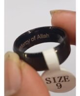 Ring Cincin Muslim Yangqi Cocktail Shahada H5013 Black | WP 0152 Ring Cincin Muslim Yangqi Cocktail Shahada H5013 Black 1. Features: - Shahada Engraving Design: Features an elegant Shahada inscription design, making it a meaningful and symbolic accessory for Muslim wearers as a daily reminder of faith. - Premium Titanium Construction: Crafted from high-quality titanium material, offering exceptional strength, lightweight comfort, and outstanding corrosion and tarnish resistance for long-lasting wear. - Black Finish: Finished in a sleek and modern black coating that gives the ring a bold and sophisticated appearance suitable for everyday and formal wear alike. - Comfortable Width and Thickness: Measures 8 MM in width and 2 MM in thickness, providing a substantial and comfortable feel on the finger without being overly bulky. - Wide Size Range: Available in sizes 6 through 11, accommodating a broad range of finger sizes for both men and women. Hypoallergenic Material: Titanium is naturally hypoallergenic, making this ring safe and comfortable for those with sensitive skin or metal - allergies. - Durable and Scratch Resistant: Titanium's natural hardness makes this ring highly resistant to scratches and daily wear, maintaining its appearance and finish over years of regular use. - Versatile Style: Suitable for daily wear, religious occasions, and as a meaningful gift for Muslim friends and family. 2. Specification: Brand: Yangqi Model: H5013 Material: Titanium Finish: Black Width: 8 MM Thickness: 2 MM Size: 6 to 11 Condition: New 3. Description: The Yangqi Shahada Titanium Ring H5013 is a beautifully crafted Islamic accessory designed for Muslim wearers who wish to carry their faith with them every day. Engraved with the Shahada inscription, this ring serves as a constant and meaningful reminder of one's devotion and belief, presented in an elegant and wearable form. Crafted from premium titanium, this ring combines lightweight comfort with exceptional durability — titanium is renowned for its high strength-to-weight ratio, natural hypoallergenic properties, and superior resistance to corrosion and scratching. The bold black finish adds a modern and sophisticated edge that pairs well with both casual and formal styles, making it a versatile everyday accessory. At 8 MM wide and 2 MM thick, the ring strikes the perfect balance between presence and comfort on the finger. Available in sizes 6 through 11, it accommodates a wide range of wearers and also makes a thoughtful and heartfelt gift for Muslim friends, family, or loved ones on any occasion. 4. How to Use: Ready to Use 5. Package Content: 1X Ring Cincin Muslim Yangqi Cocktail Shahada H5013 Black
